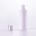 Round shoulder shaped lotion bottle with silver cap