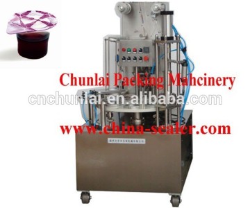Automatic nestle coffee capsule cold tea cup filling and sealing machine