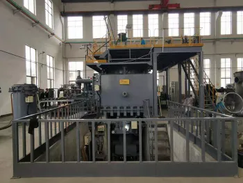 Periodic Vacuum Induction Strip Caster Type II