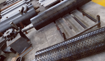 Roll forming machine embossing shaft