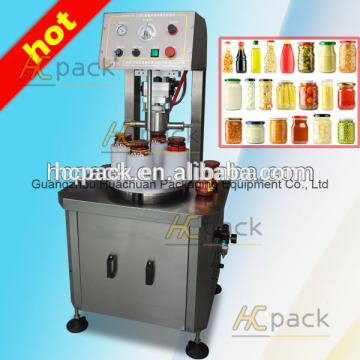 Glass bottles machine with vacuum-pumping system