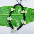 Noix de kukui acrylique divisée par collier de bougainvillea lei