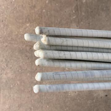 Plastic-wrapped stainless steel cable pins