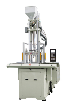 Double sliding high speed vertical injection moulding machine