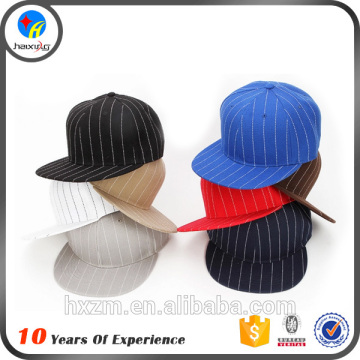 Flat brim closed back 6 panel fitted hat