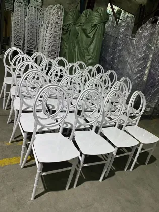 Stackable Infinity White Resin Phoenix Chair Rentals for Weddings and Events