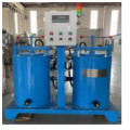 Dual flow wax liquid filtration system