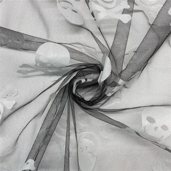 Halloween Glow in The Dark Skulls Tulle Fabric