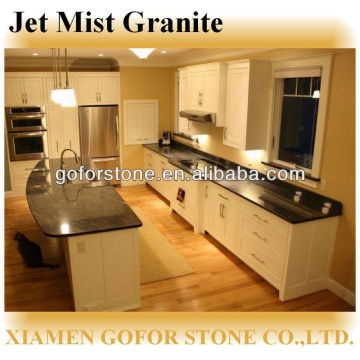 Jet Mist black granite countertops with wood cabinets