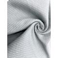 57% Cotton 38% Polyester 5% Spandex Rib Fabric