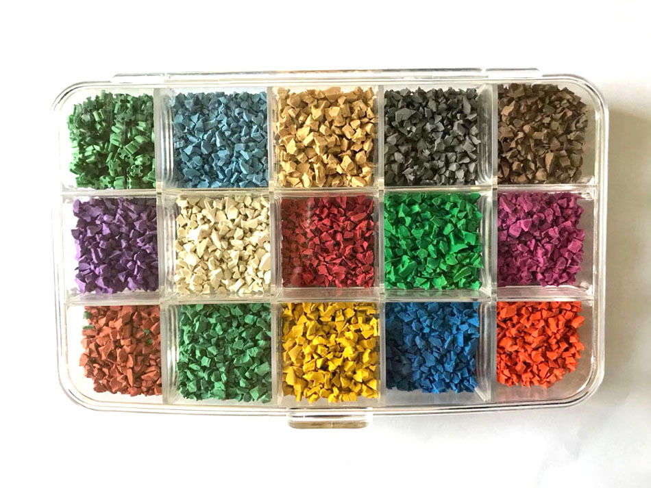 Partículas de caucho coloreadas (2) Colored rubber particles (2)