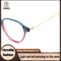 Armações ópticas femininas circulares de acetato e metal