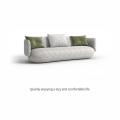 Contemporary three-seater fabric sofa