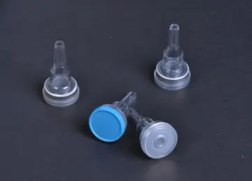 Outport composite stopper for I.V fluid bag