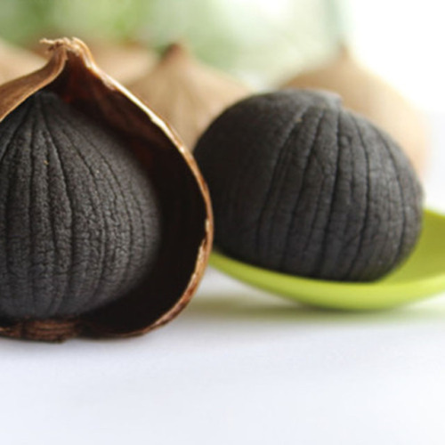 Ingeblikte en vacuümzak Solo Black Garlic