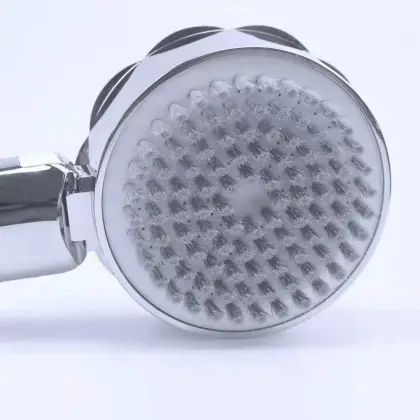 Handheld shower nozzle pressurized with scrubbing function