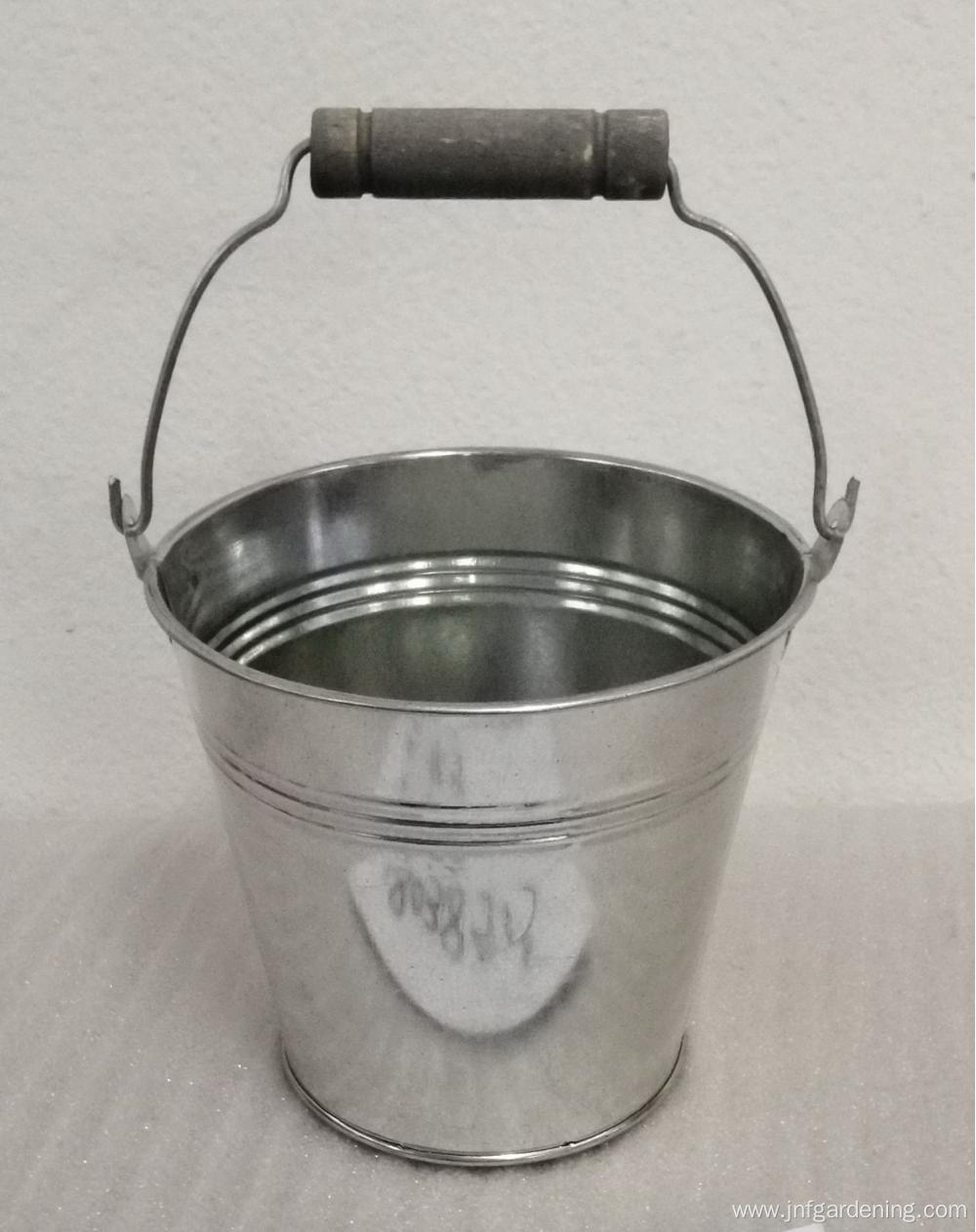 Metal round bucket with metal handle