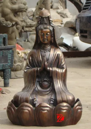 bronze kyan yin statue sitting on lotus flower