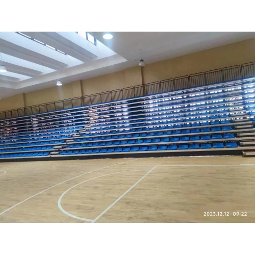 Electrical telescopic bleacher seat
