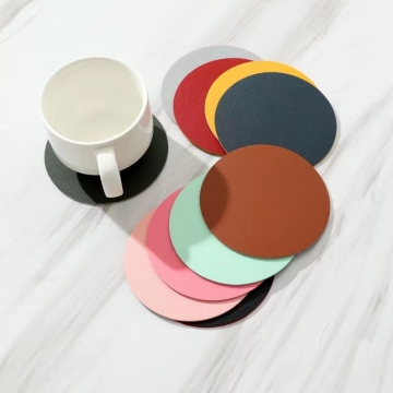 Set coaster berukir kulit PU dua sisi: Bentuk bundar tahan panas dengan detail jahitan