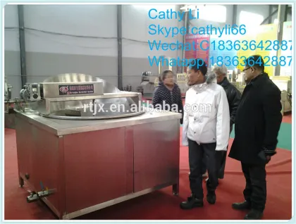 Automatic stir frying machine