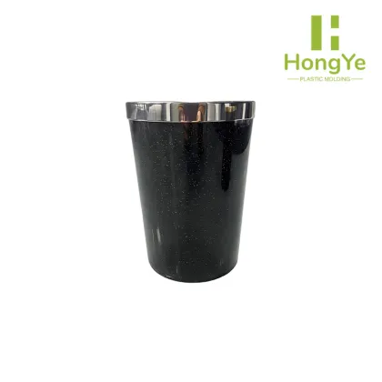 Large black and silver point trash can