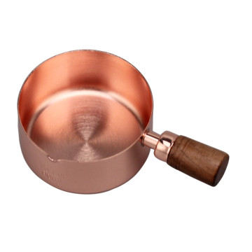 wooden handle gold color measuring cup