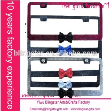 rhinestone license plate frame holder with middle bow tie