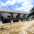 Wear-resistant and anti-clogging intermediate buffer silo