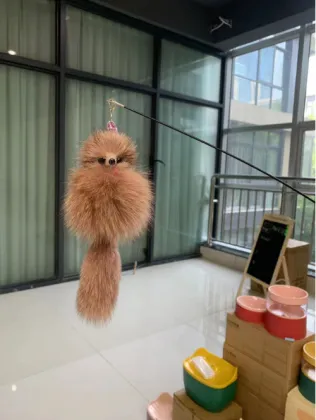 MOFESIPI Pet Cat Toy: Retractable Feather Teaser Stick