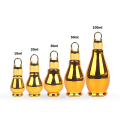 Botella de aceite esencial de vidrio dorado de 30 ml con cuentagotas