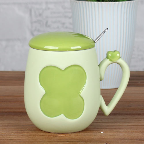 four leaf clover and heart coffee mug