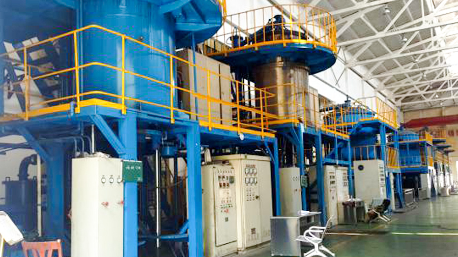 Bottom discharge vertical graphitization furnace