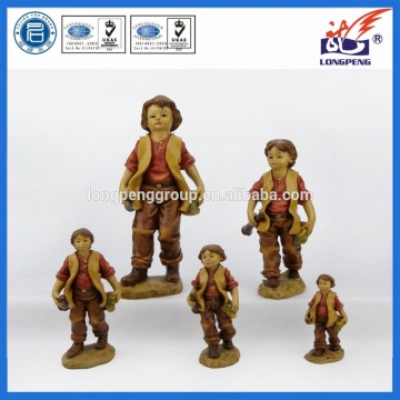 Little boy with banana figurine made of eco-friendly polyresin