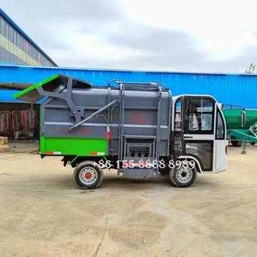 Camion de déchets montés sur latéraux à quatre roues électriques