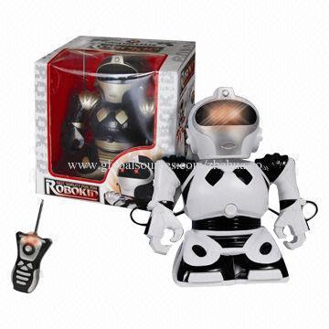 Battery operated toy robot with walk, revolve and record function