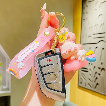 Cute Rainbow Fart Doll Keychain - Creative Cartoon Plastic Pendant for School Bags