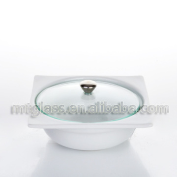 white ceramic bakeware pot with glass cover