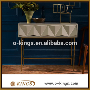 Luxury golden console table with irregular geometry drawers