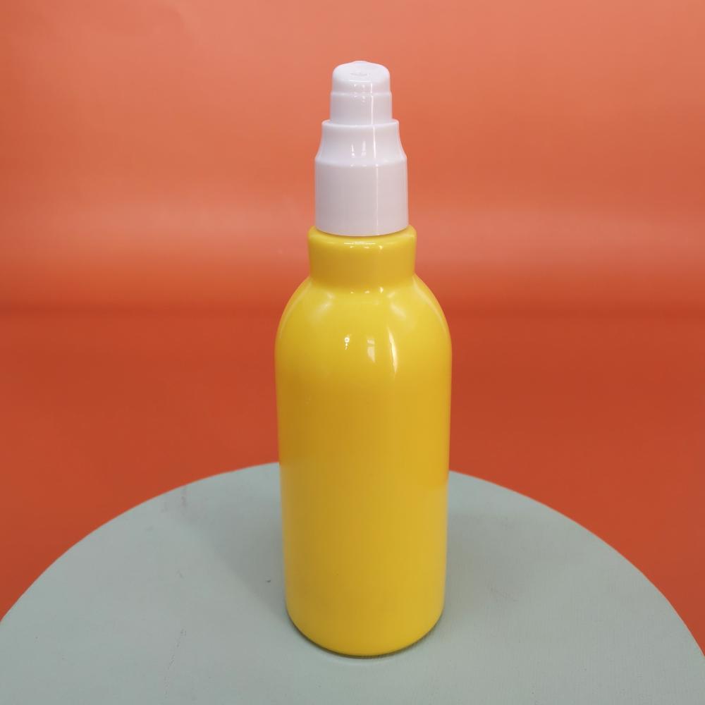 Yellow Lotion Glass Bottle And Pump