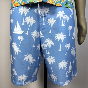 sky blue pineapple-patterned beach shorts
