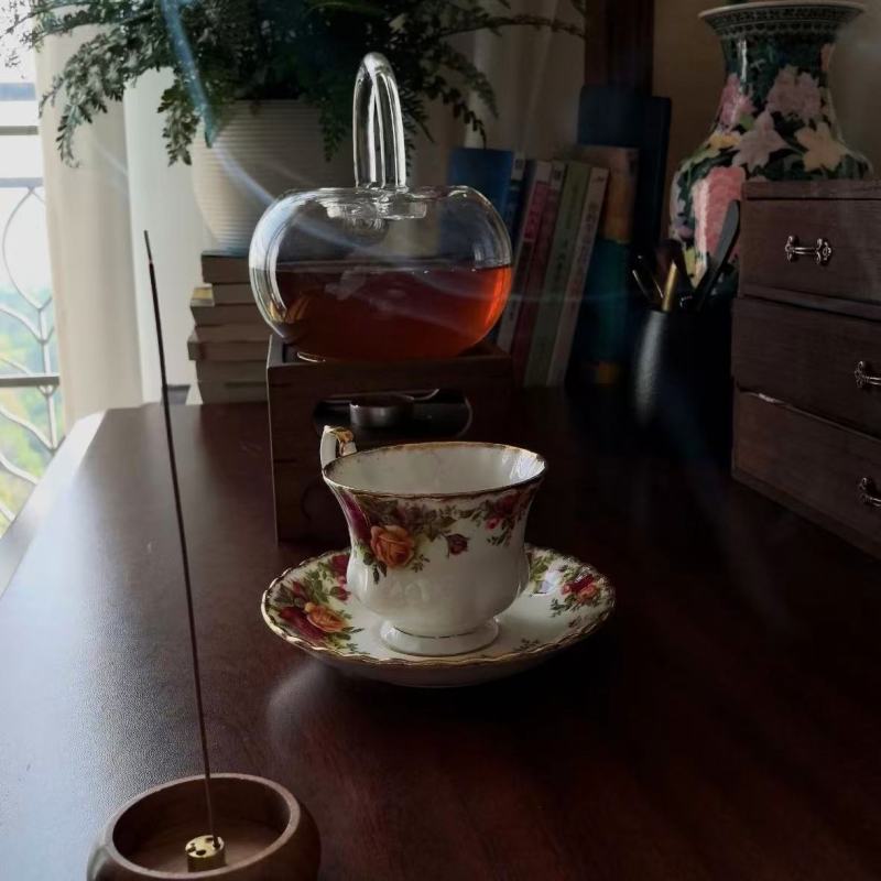 Elegant Porcelain Tea Set with Floral Design and Gold Trim