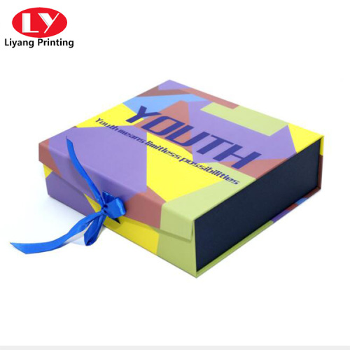 Full color CMYK folding flat box with ribbon