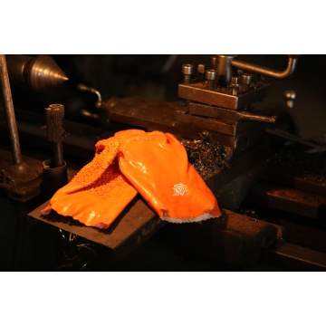 Orange pvc coated gloves chips on the palm