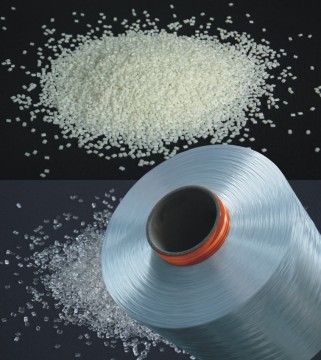 adhesive activated polyester low shrinkage yarn