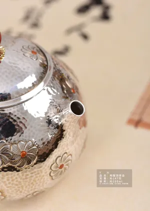 Handcrafted Silver Teapot with Delicate Daisy Hammer Design