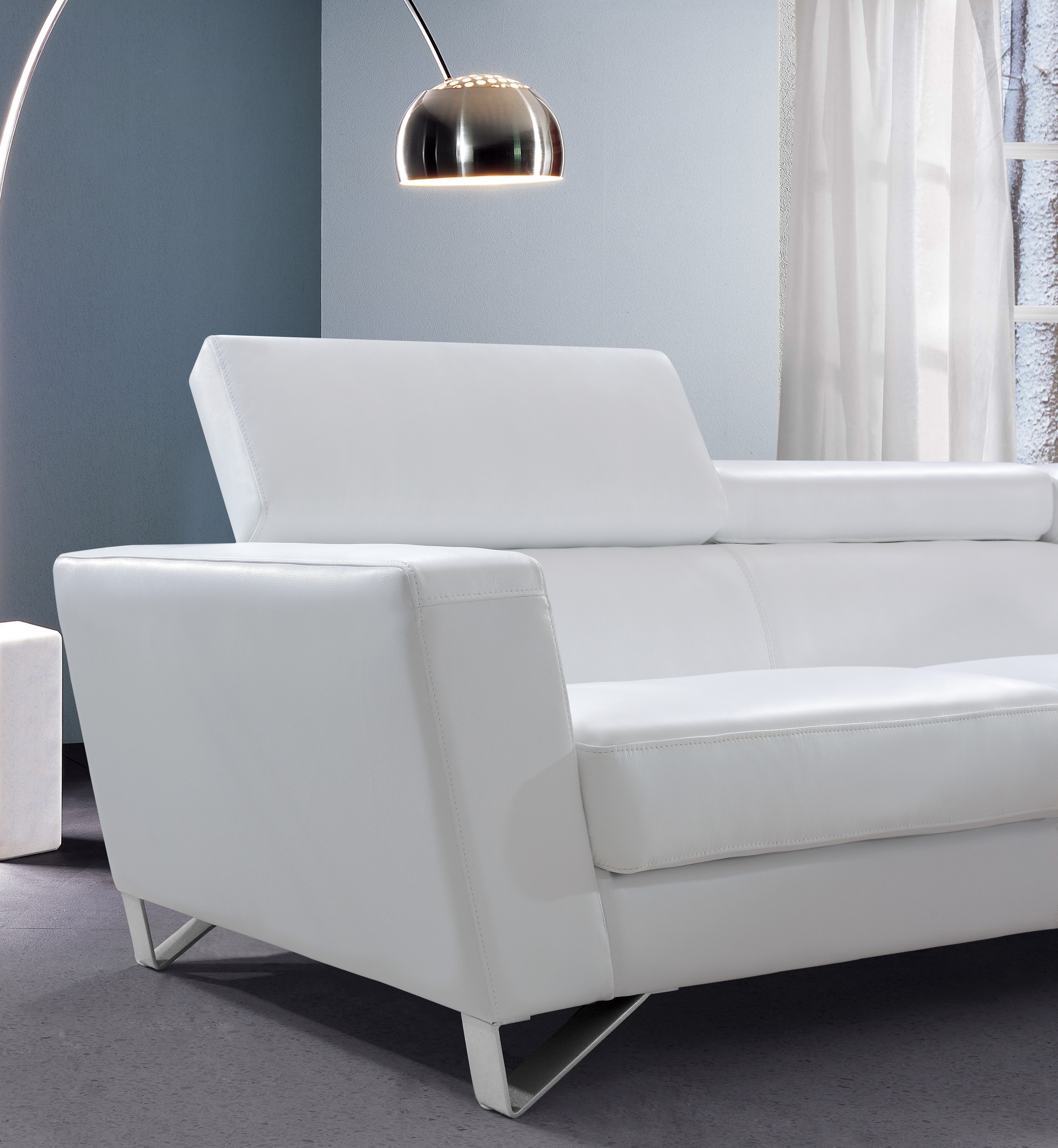 white natural leather sofa