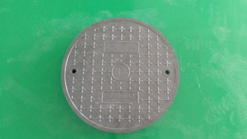 9/5000   Macromolecular composite manhole cover.