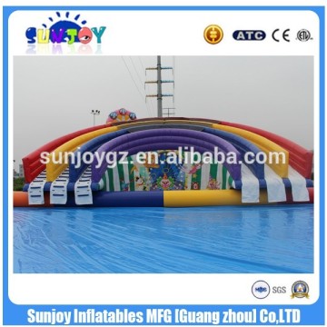 Funny and exciting giant slide pool inflatable water park equipment games for sale