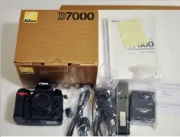 Nikon D7000 Digital SLR Camera Body with 18-200mm VR II Zoom Lens +16GB Card + Filter + Case + Kit